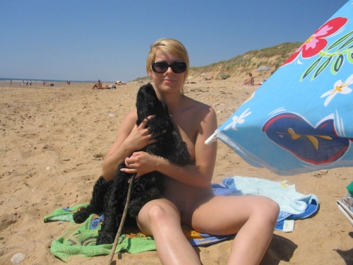 Hot Nude Beach Babe Soaks Up Sun - Explicit Amateur Pic