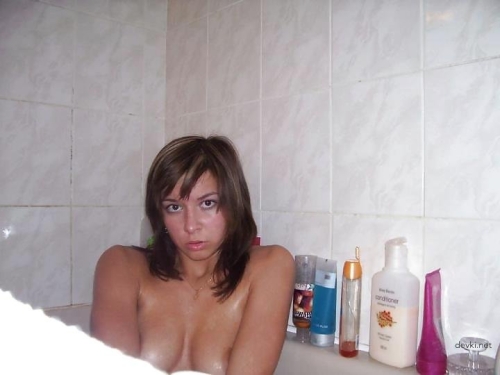 Steamy Amateur Bath Photos: Naked Girl Seductively Poses in Tub - Explicit Bathroom Shots