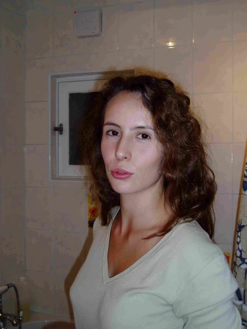 Uncensored Brunette's Sensual Home Erotica: Explicit Photos for Adults