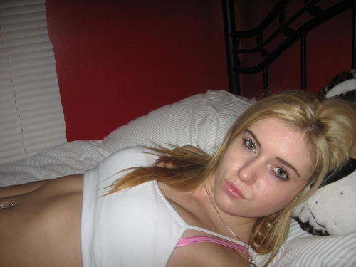 Explicit Topless Blonde Amateur in Raunchy Photoshoot Exposed