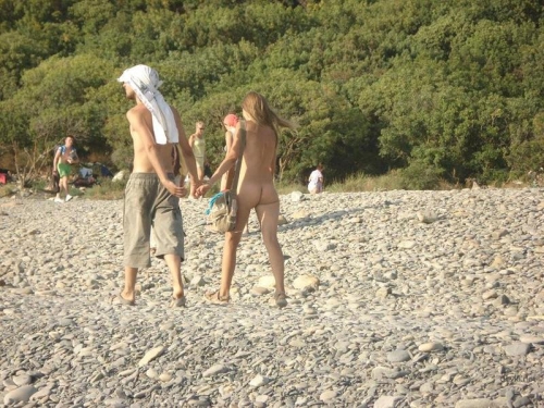 Wild Beach Party: Young Adults Enjoying Explicit Fun in the Sun