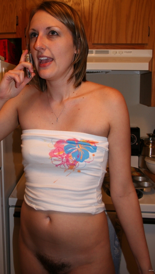 Sexy Smiling Woman Poses Seductively in Amateur Photo Shoot