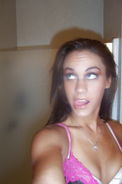 Sensual Topless Selfie: Amateur Girl Bares All in Explicit Nude Photo Shoot