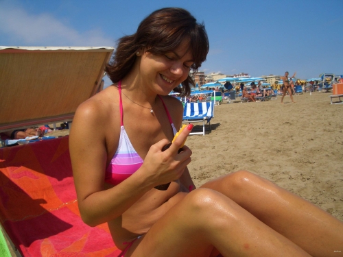 Explicit Topless Sunbathing: Amateur Girl Fully Nude in Racy Photo