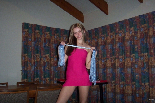 Explicit Nude Model Poses Seductively in Amateur Photo Shoot