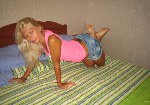Blonde Babe Strips: Explicit Amateur Pantyless Photo