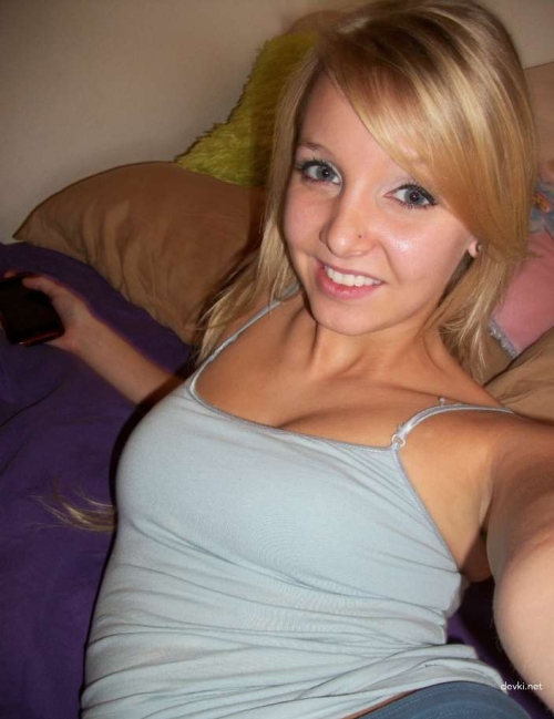 Explicit Tattooed and Pierced Amateur Babe Shows Off - Hot Girl with Tattoos and Piercings in Racy Photo