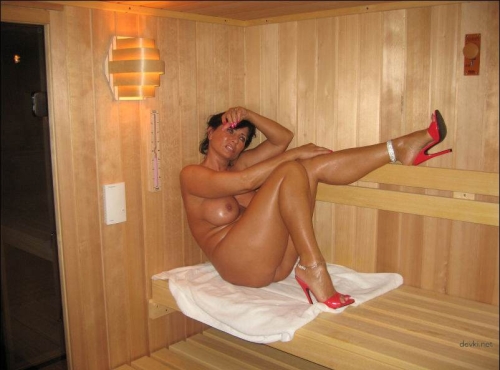 Steamy MILF Sauna Session: Naked Mature Woman in Explicit Amateur Photo - Hot, Steamy, Explicit