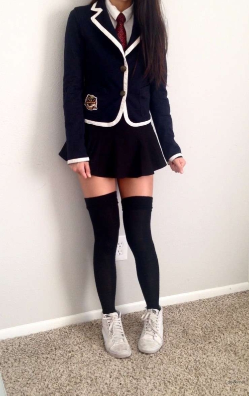 Explicit Schoolgirl Poses Seductively for Amateur Photos