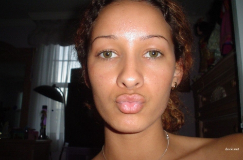 Explicit Mulatto Amateur's Hairy Bush Exposed in Uncensored Photo