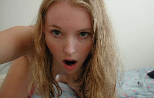 Sultry Amateur Photos: Seductive Girl's Erotic Poses and Playful Charms