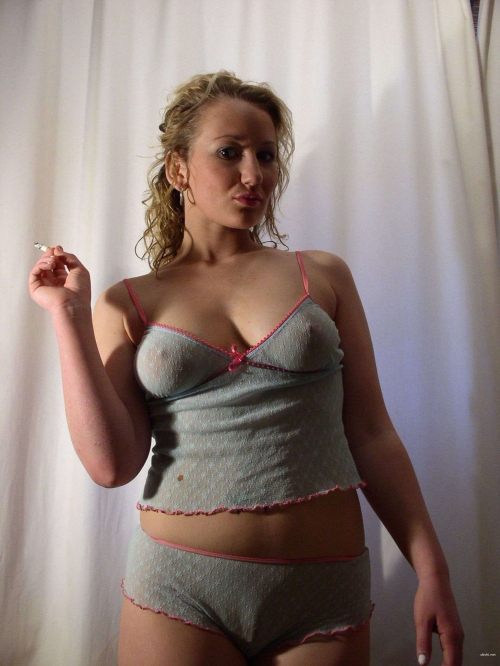 Amateur Nude Woman Poses Explicitly in Private Photo Shoot