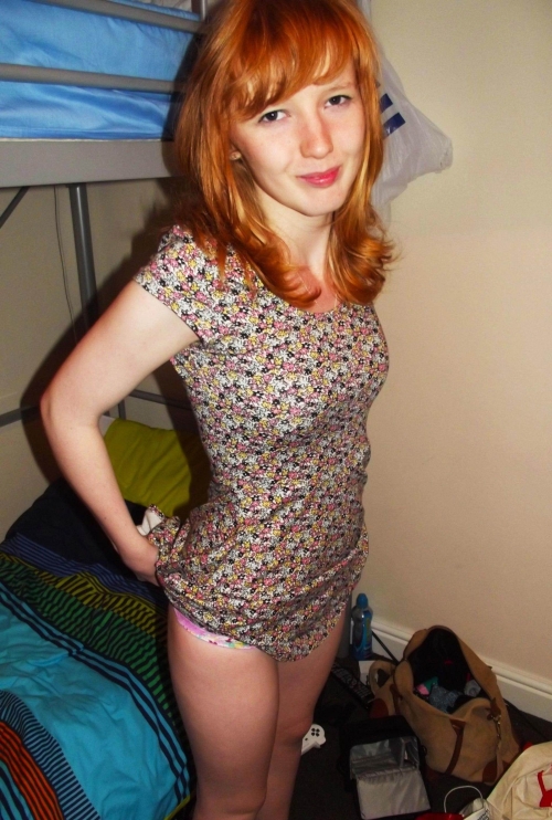 Explicit Redhead Beauty in Erotic Amateur Photo Shoot