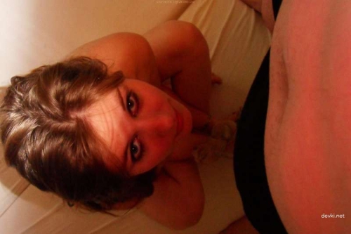 Explicit Mulatto Amateur Poses Topless in Raunchy Photo Shoot