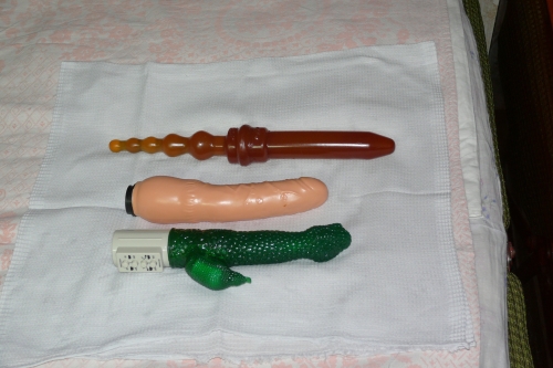 Hot MILF Playing with Dildos: Uncensored Amateur Porn Pic