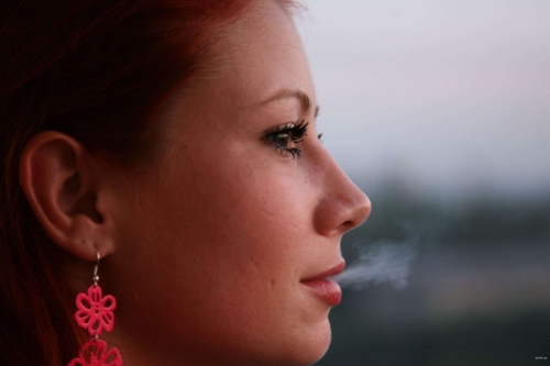 Sizzling Redhead Babe Strips Down for X-Rated Photoshoot