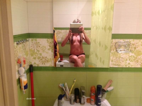 Seductive Selfie: Stunning Girl Capturing Provocative Images of Herself
