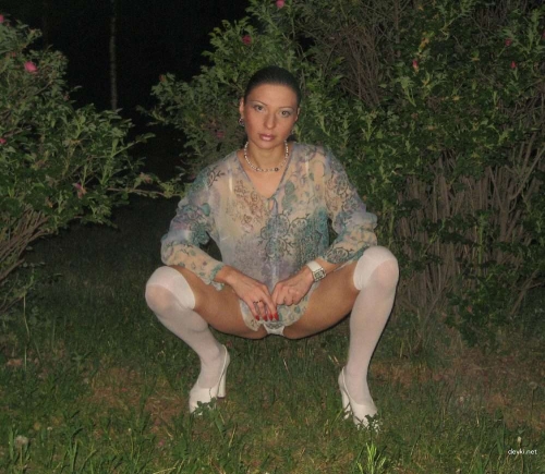 Steamy Amateur Photo: Sexy Woman Shows Off Bushy Pussy at Home - Explicit Content
